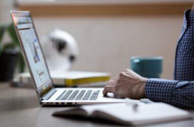 Person typing on a laptop | Photo by Burst