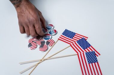 American Flags and vote pins | Photo by cottonbro studio