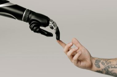 Bionic Hand and Human Finger Touching | Photo by cottonbro from Pexels