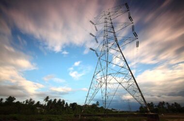 Black metal electricity post | Photo by Pok Rie