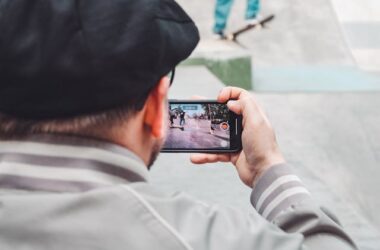 Person holding phone | Photo by Jan Kopřiv